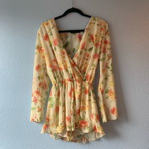 Dolls Kill honey punch floral romper